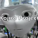 A humanoid robot named Kojiro showcasing the musculoskeletal system, intricately designed to mimic the movements and functions of the human body. The words 