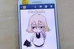 A spotted Samsung Galaxy S3 with an anime character on the screen.